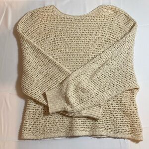 Cream colored, long sleeved knit cover up 

Brand: Billa Bong